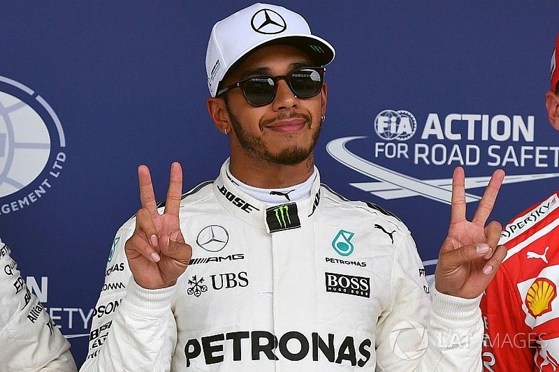 Pole sitter Lewis Hamilton, Mercedes AMG F1 celebrates in parc ferme