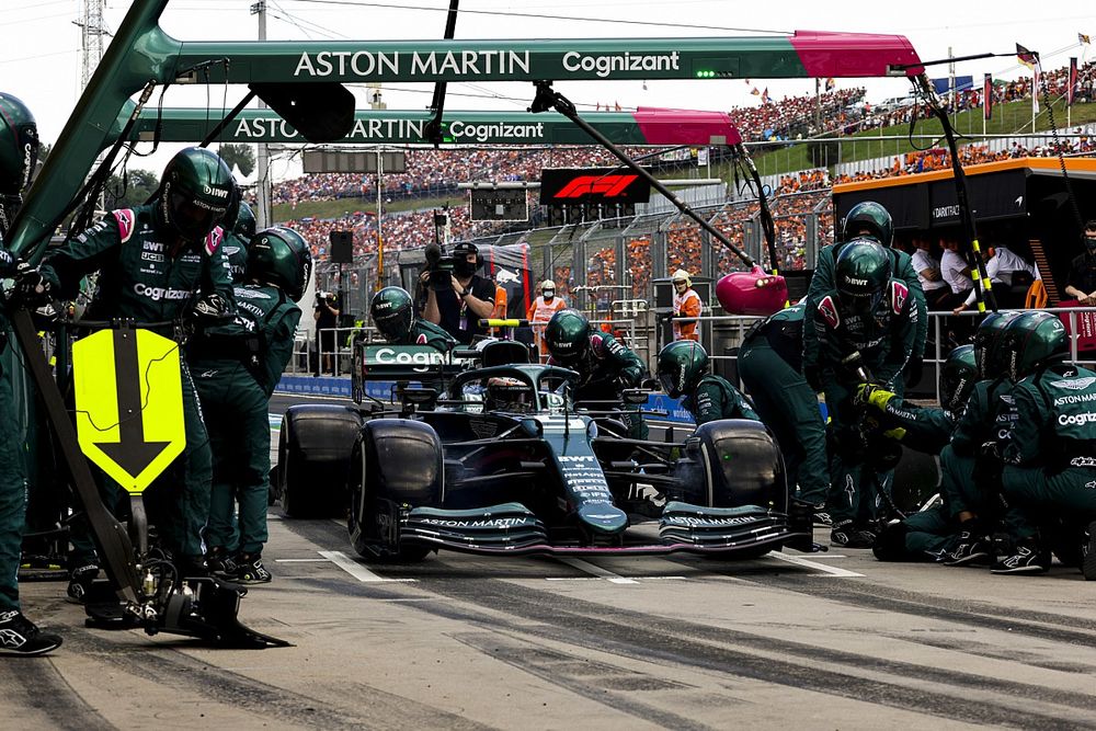 Sebastian Vettel, Aston Martin AMR21, makes a pit stop