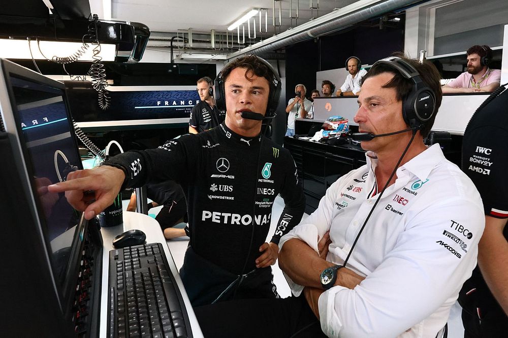 Nyck de Vries, Test and Reserve Driver, Mercedes AMG, analyses data with Toto Wolff, Team Principal and CEO, Mercedes AMG 