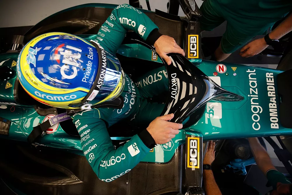 Fernando Alonso, Aston Martin F1 Team, settles into his seat