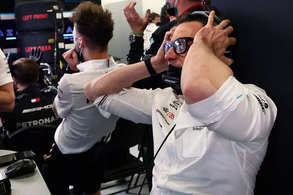 Toto Wolff, Team Principal and CEO, Mercedes AMG reacts to the screen in the garage