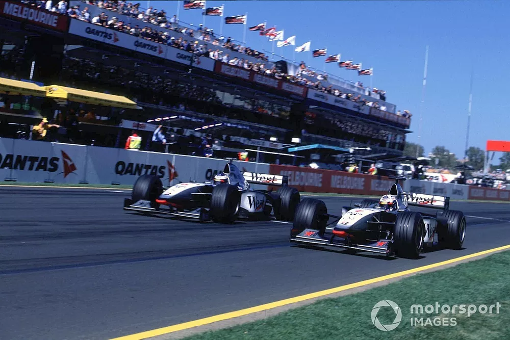 Mika Hakkinen, McLaren Mercedes passes David Coulthard, McLaren