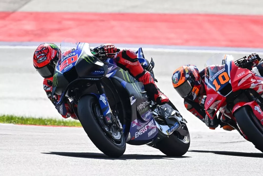Fabio Quartararo, Yamaha Factory Racing leads Luca Marini, Honda HRC