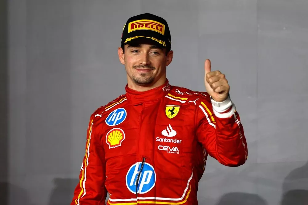 Charles Leclerc, Scuderia Ferrari, 2nd position, celebrates on the podium 