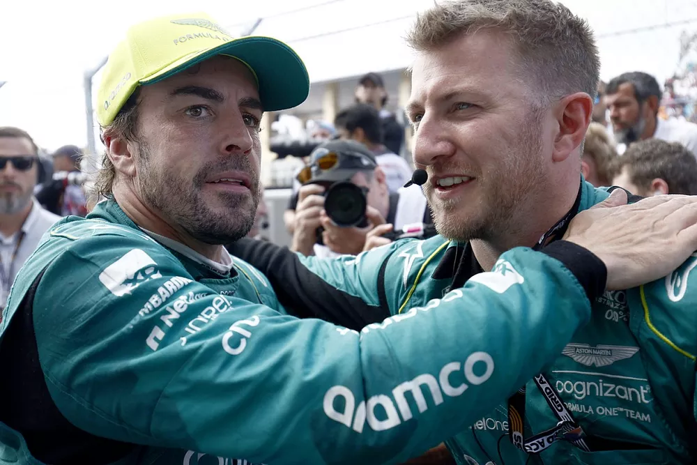 Fernando Alonso, Aston Martin F1 Team, 3rd position, celebrates with a team mate in Parc Ferme