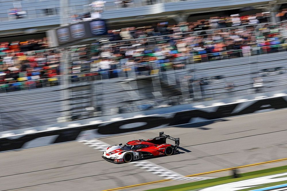 #7 Porsche Penske Motorsport Porsche 963: Felipe Nasr, Nick Tandy, Laurens Vanthoor crossing the finish line