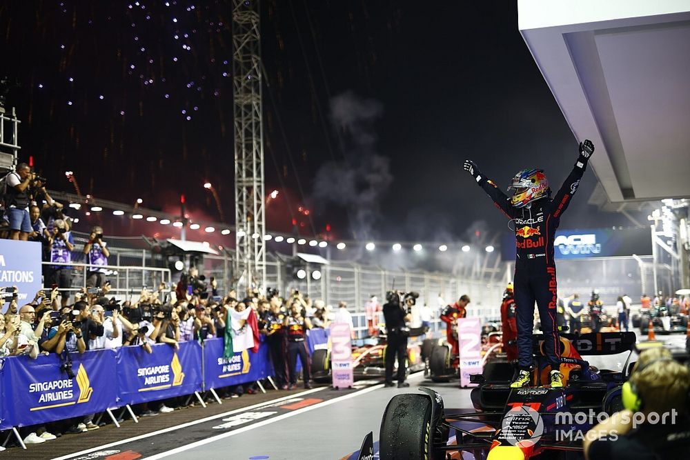 Fireworks light the sky as Sergio Perez, Red Bull Racing, 1st position, celebrates in Parc Ferme
