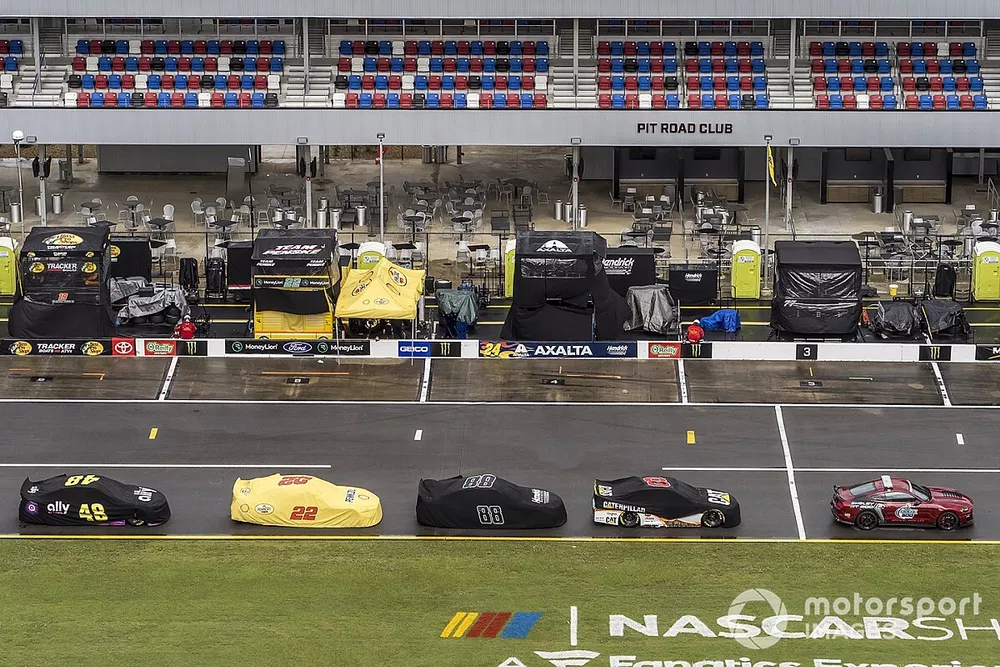 Nascar Cup cars back on the pit road due to the rain delay