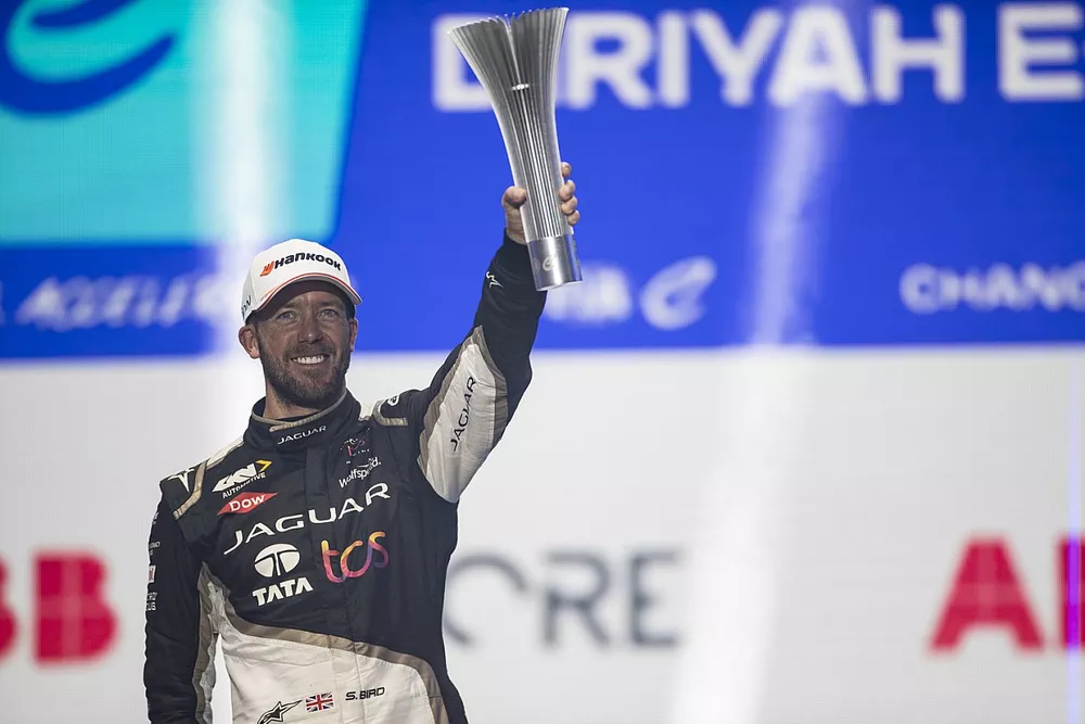 Sam Bird, Jaguar Racing, 3rd position, lifts his trophy