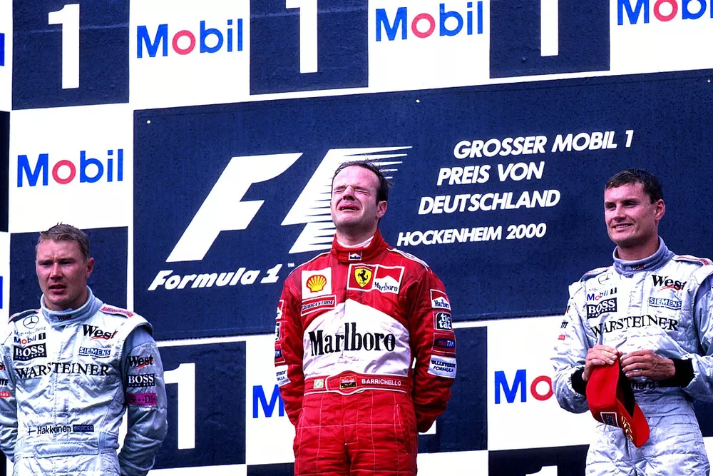 Podium: Race winner Rubens Barrichello, Ferrari F1 2000, second place Mika Hakkinen,  Mclaren  MP4-15