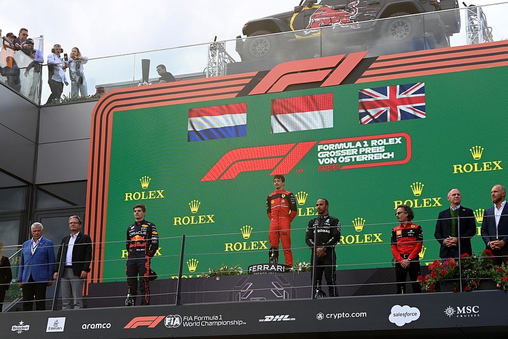 Max Verstappen, Red Bull Racing, 2nd position, Charles Leclerc, Ferrari, 1st position, Lewis Hamilton, Mercedes-AMG, 3rd position, Laurent Mekies, Racing Director, Ferrari, on the podium