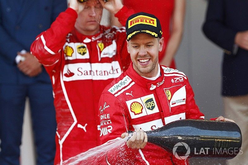 Podium: race winner Sebastian Vettel, Ferrari, second place Kimi Raikkonen, Ferrari