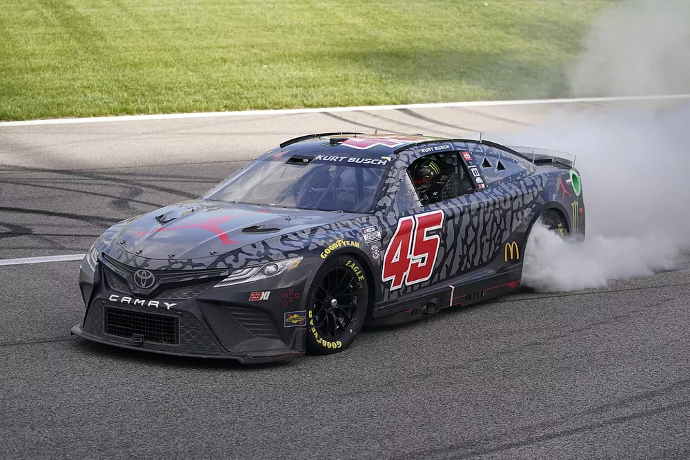 Race winner Kurt Busch, 23XI Racing, Jordan Brand Toyota Camry