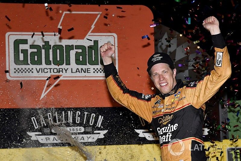 Brad Keselowski, Team Penske, Ford Fusion Miller Genuine Draft celebrates his win