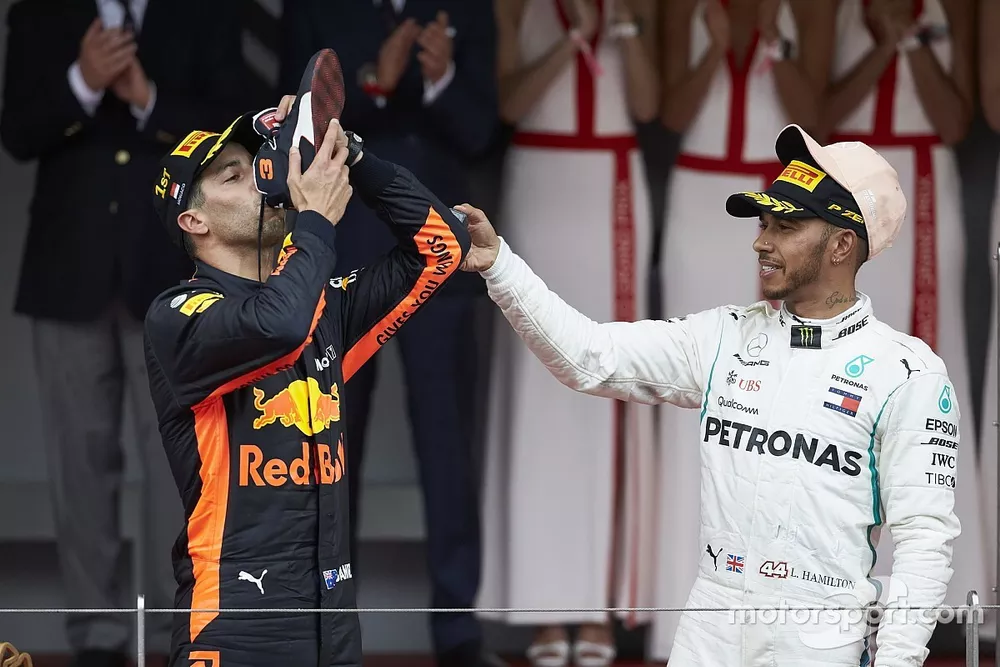 Race winner Daniel Ricciardo, Red Bull Racing, drinks from his shoe with Lewis Hamilton, Mercedes AMG F1