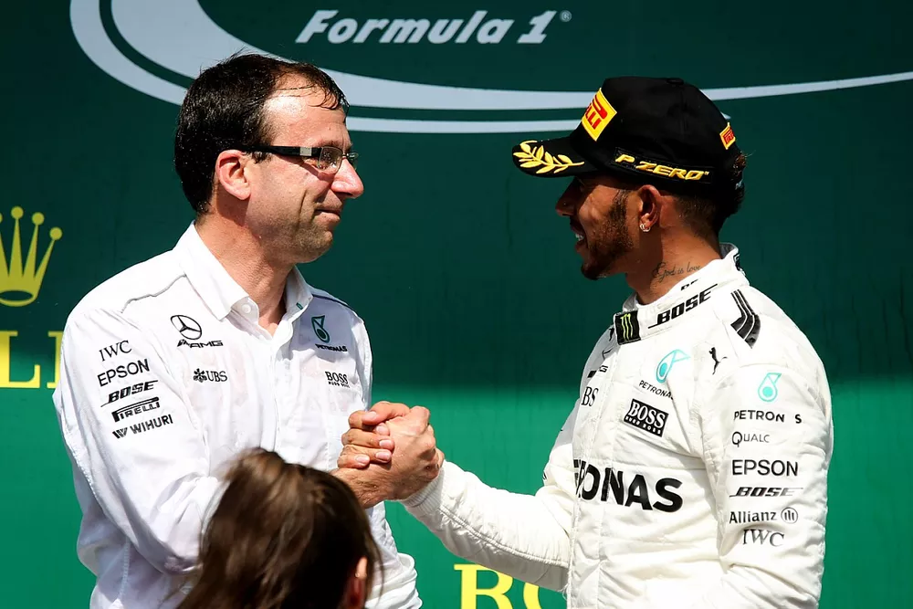 Lewis Hamilton, Mercedes AMG F1 celebrates on the podium, Loic Serra, Mercedes AMG F1 Head of Vehicle Dynamics