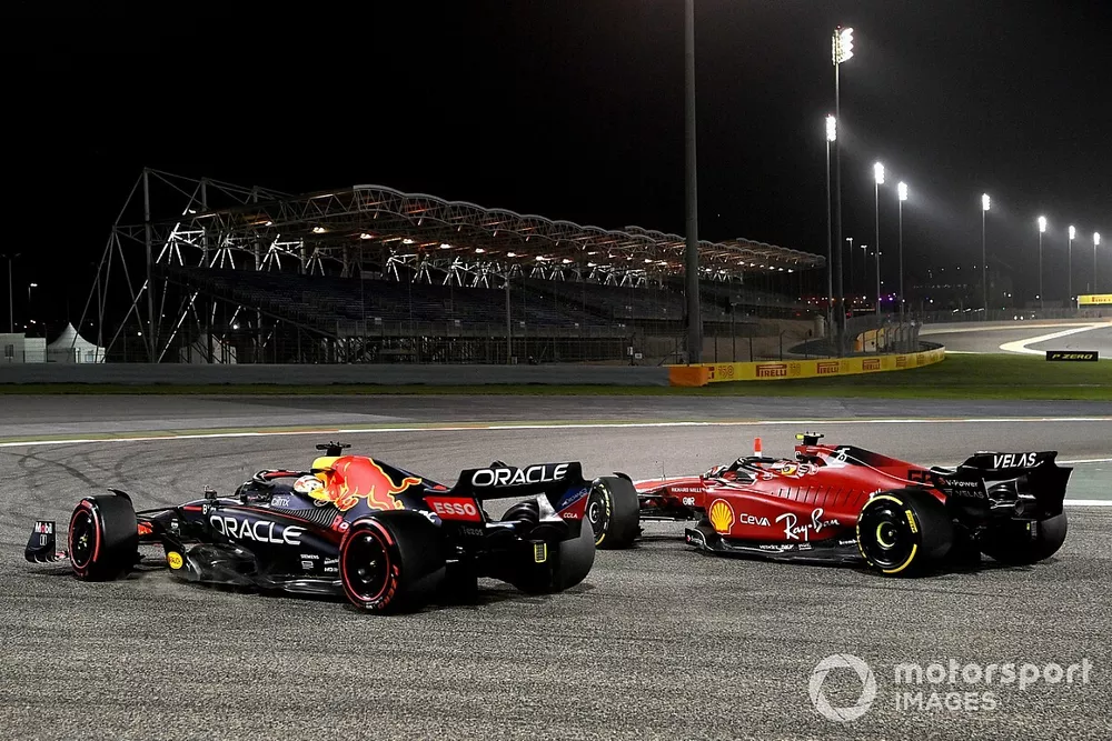 Carlos Sainz Jr., Ferrari F1-75, leads Max Verstappen, Red Bull Racing RB18