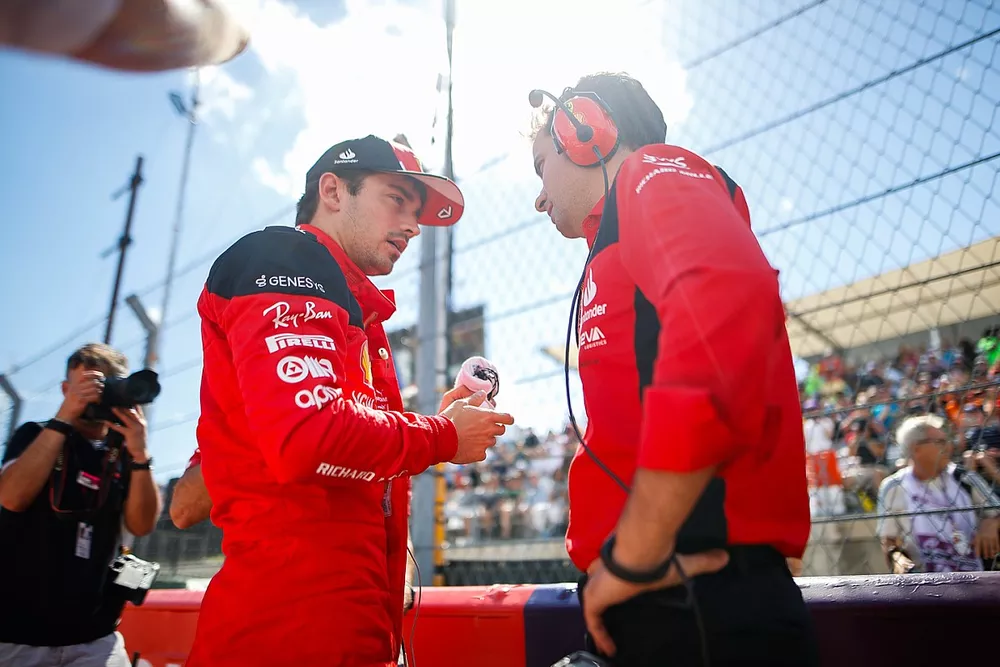 Charles Leclerc, Scuderia Ferrari, on the grid with an engineer