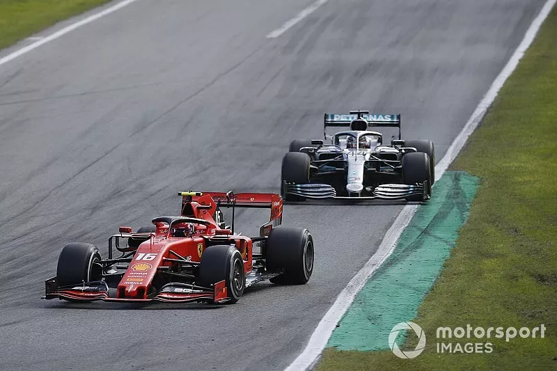 Charles Leclerc, Ferrari SF90, leads Lewis Hamilton, Mercedes AMG F1 W10