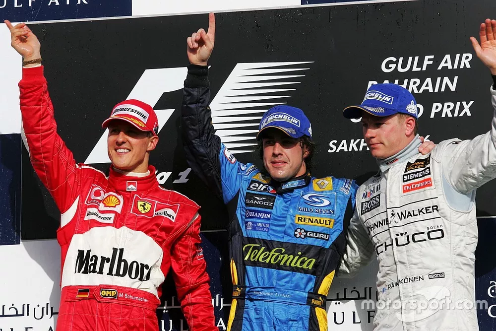 Podio: segundo puesto Michael Schumacher, Ferrari, ganador de la carrera Fernando Alonso, equipo Ren
