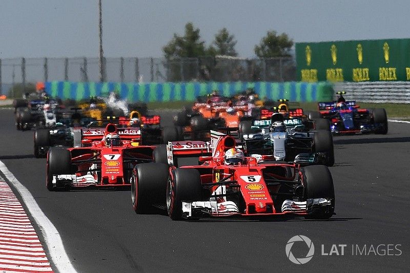 Sebastian Vettel, Ferrari SF70-H leads at the start of the race