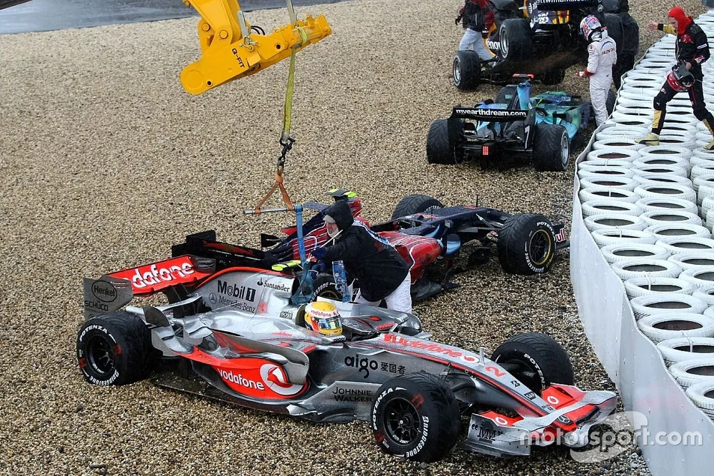 Lewis Hamilton, McLaren Mercedes, MP4-22 is lifted back onto the circuit