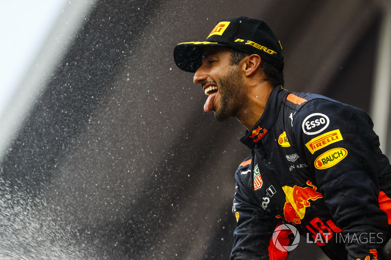 Third place Daniel Ricciardo, Red Bull Racing, sprays Champagne on the podium