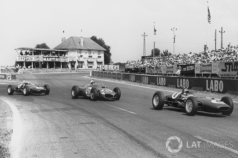 Jim Clark, Lotus 21-Climax, Giancarlo Baghetti, Ferrari Dino 156, e Innes Ireland, Lotus 21-Climax