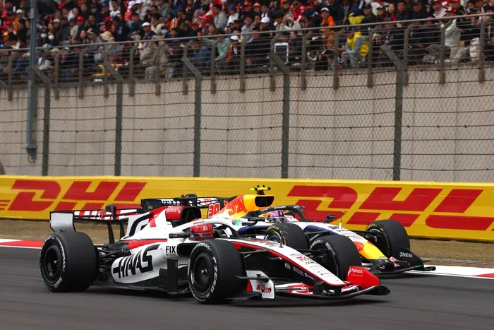 Esteban Ocon, Haas F1 Team, Isack Hadjar, Red Bull Racing