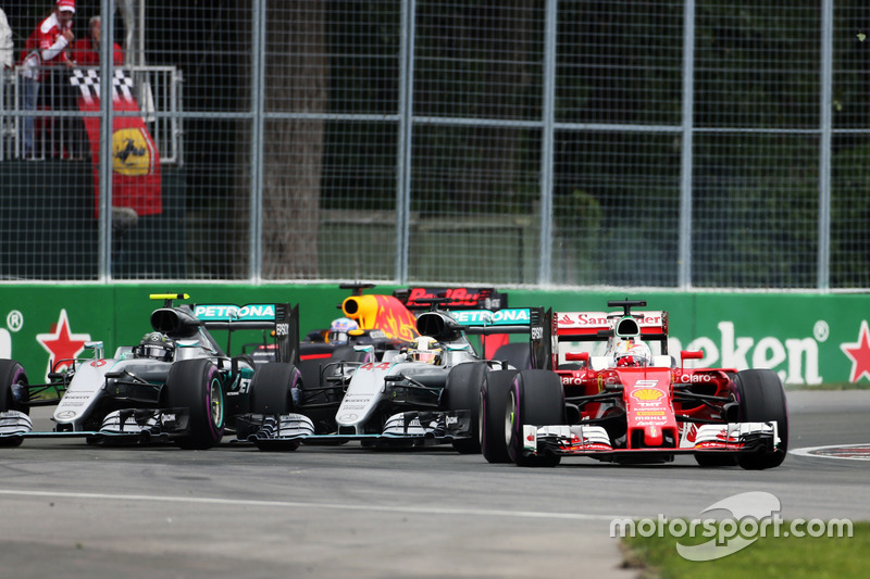 Sebastian Vettel, Ferrari SF16-H leads Lewis Hamilton, Mercedes AMG F1 W07 Hybrid and Nico Rosberg, Mercedes AMG F1 W07 Hybrid at the start of the race