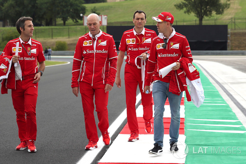 Sebastian Vettel, Ferrari walks the track with Jock Clear, Ferrari Chief Engineer and Riccardo Adami, Ferrari Race Engineer