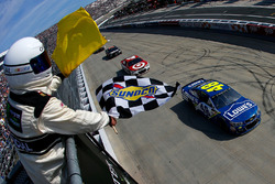 Jimmie Johnson, Hendrick Motorsports Chevrolet, takes the checkered flag in front of Kyle Larson, Chip Ganassi Racing Chevrolet