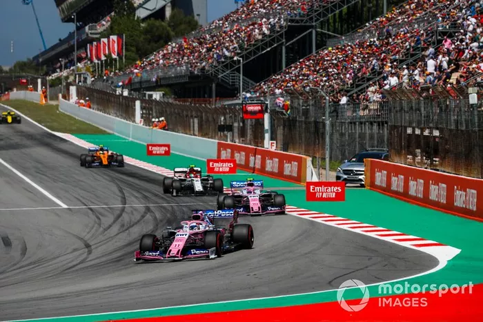 Sergio Pérez, Racing Point RP19, lidera Lance Stroll, Racing Point RP19, Antonio Giovinazzi, Alfa Romeo Racing C38, y Lando Norris, McLaren MCL34