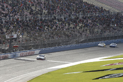 Joey Logano, Team Penske, Ford Mustang Discount Tire takes the checkered flag ahead of Justin Allgaier, JR Motorsports, Chevrolet Camaro Hellmann's and Elliott Sadler, JR Motorsports, Chevrolet Camaro Cessna