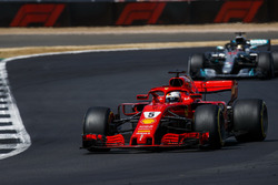 Sebastian Vettel, Ferrari SF71H, leads Lewis Hamilton, Mercedes AMG F1 W09