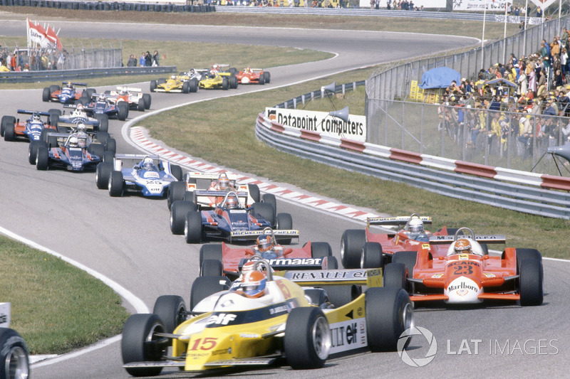 Jean-Pierre Jabouille, Renault RE20, leads Nelson Piquet, Brabham BT49-Ford Cosworth, hidden, Bruno Giacomelli, Alfa Romeo 179B, Gilles Villeneuve, Jody Scheckter, both Ferrari 312T5, Mario Andretti, Lotus 81-Ford Cosworth, John Watson, McLaren M29C-Ford Cosworth, Didier Pironi, Ligier JS11/15-Ford Cosworth, Elio de Angelis, Lotus 81-Ford Cosworth, Riccardo Patrese, Arrows A3-Ford Cosworth, Jean-Pierre Jarier, Tyrrell 010-Ford Cosworth, Eddie Cheever, Osella FA1-Ford Cosworth, and Nigel Mansell, Lotus 81B-Ford Cosworth, at the start