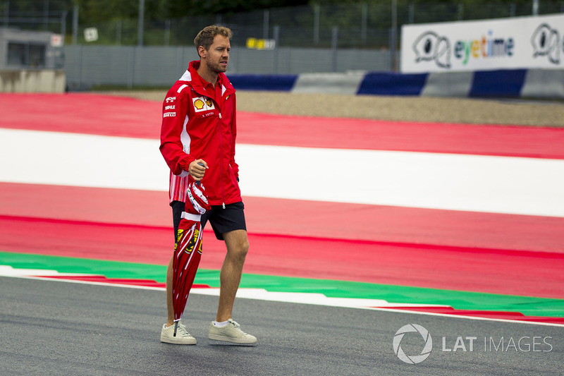 Sebastian Vettel, Ferrari walks the track
