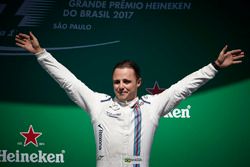 Felipe Massa, Williams, waves to his home fans from the podium after his final home race