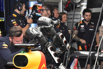 Red Bull Racing team members at work