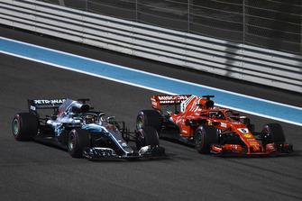 Lewis Hamilton, Mercedes AMG F1 W09 EQ Power+ and Sebastian Vettel, Ferrari SF71H wave to the crowd at the end of the race
