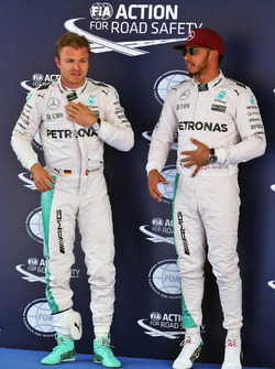 Nico Rosberg, Mercedes AMG F1 with team mate and pole sitter Lewis Hamilton, Mercedes AMG F1 in parc ferme