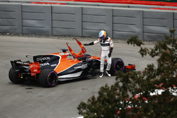Fernando Alonso, McLaren MCL32, climbs out of his car after stopping in FP1, technical issues