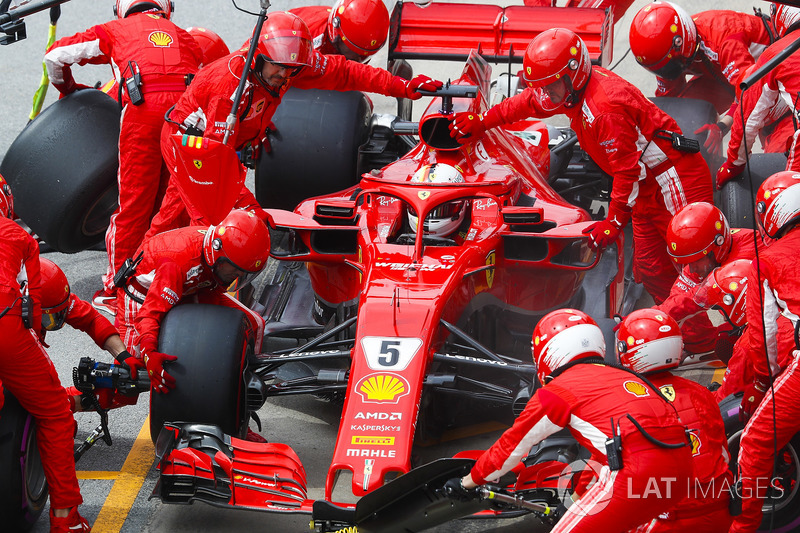 Sebastian Vettel, Ferrari SF71H, makes a pit stop