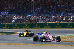 Esteban Ocon, Force India VJM11, leads Carlos Sainz Jr., Renault Sport F1 Team R.S. 18