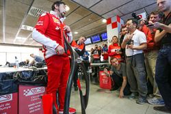 Alberto Antonini, Ferrari Press Officer discusses the Halo cockpit cover to the media