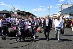 Chase Carey, Chief Executive Officer and Executive Chairman of the Formula One Group, Luca Colajanni, Formula One Senior Communications Officer and Sean Bratches, Formula One Managing Director, Commercial Operations on the grid