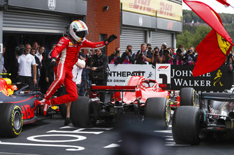 Sebastian Vettel, Ferrari SF71H, celebrates victory with a jump in parc ferme