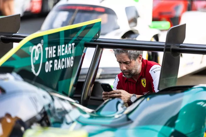  Ferrari engineers inspectingthe #007 Aston Martin Thor Team Aston Martin Valkyrie
