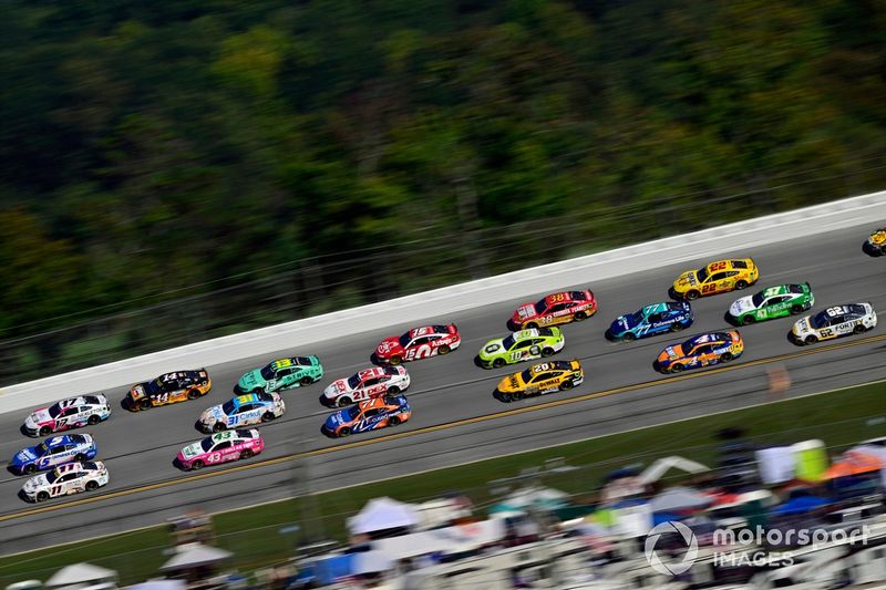 Denny Hamlin, Joe Gibbs Racing, FedEx One Rate Toyota Camry, Kyle Larson, Hendrick Motorsports, HendrickCars.com Chevrolet Camaro and Chris Buescher, RFK Racing, Nexletol Ford Mustang