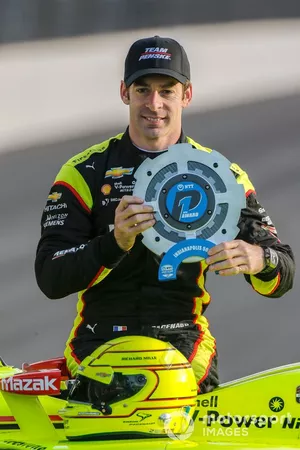NTT P1 Award and pole winner Simon Pagenaud, Team Penske Chevrolet poses for the front row photos